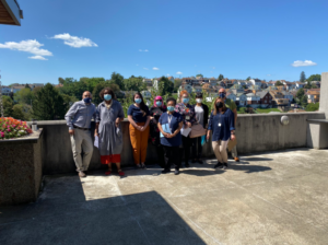 Group photo of the KaBloom judges in front of a view of Brookline