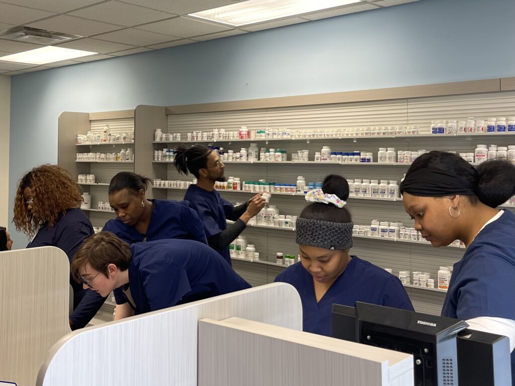 CVS Health Pharmacy Technician students hard at work inside the Workforce Innovation and Talent Center at Ebenezer Baptist Church in the Hill District.